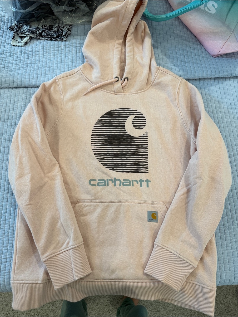 Carhartt women’s Crewneck Hoodie in Light Pink with Black Logo